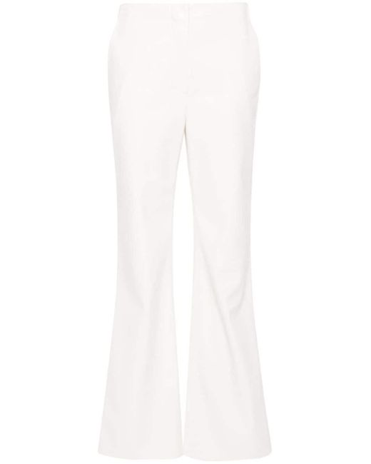 Pantalon Manola à coupe droite Nanushka en coloris White