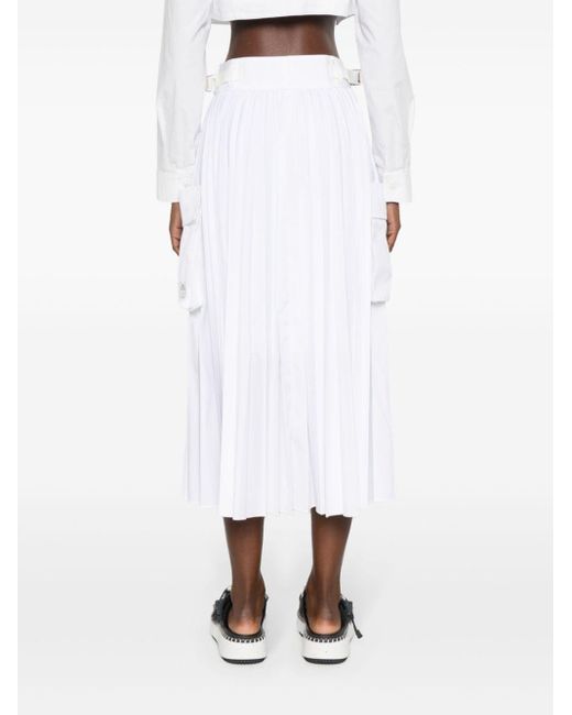 Jupe mi-longue à design plissé Sacai en coloris White