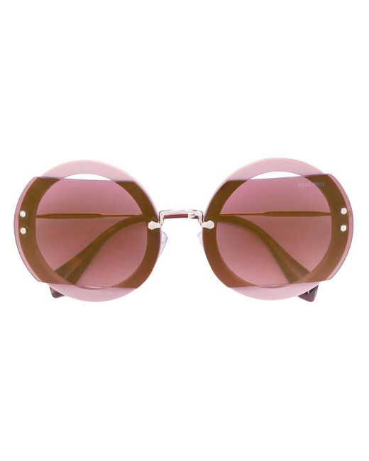 Tinted round sunglasses Miu Miu en coloris Pink