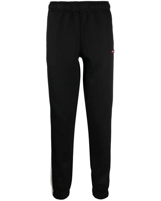 DIESEL Black Logo-Patch Tapered Track Pants for men