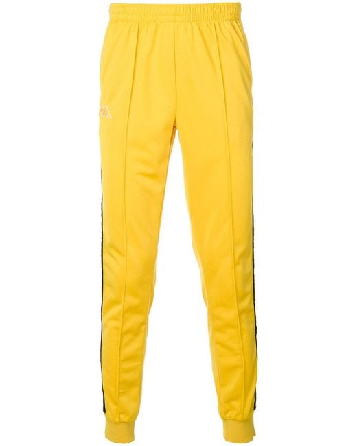 Pantalones de chándal con franja lateral Kappa de hombre de color Amarillo  | Lyst