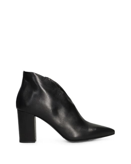 The Seller Black Pointed-Toe V-Cut Boots