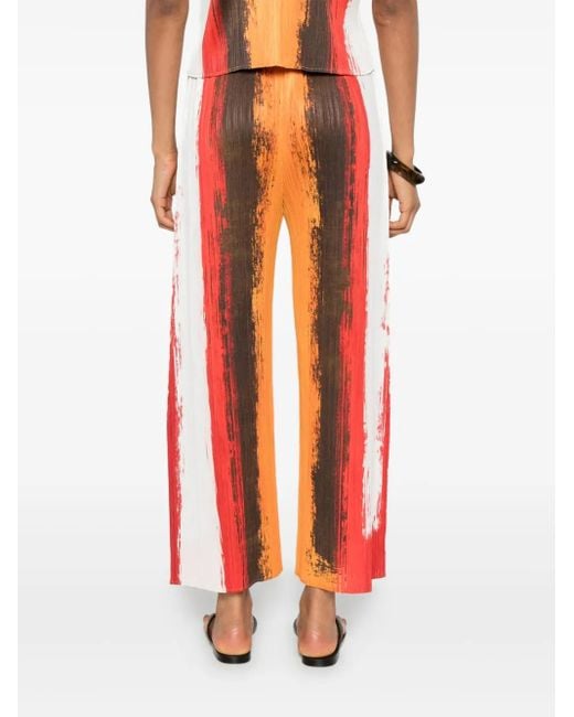 Pleats Please Issey Miyake Orange Pleated Stripe Trousers
