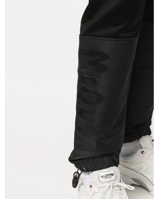 McQueen Black Panelled Tapered Track Pants for men