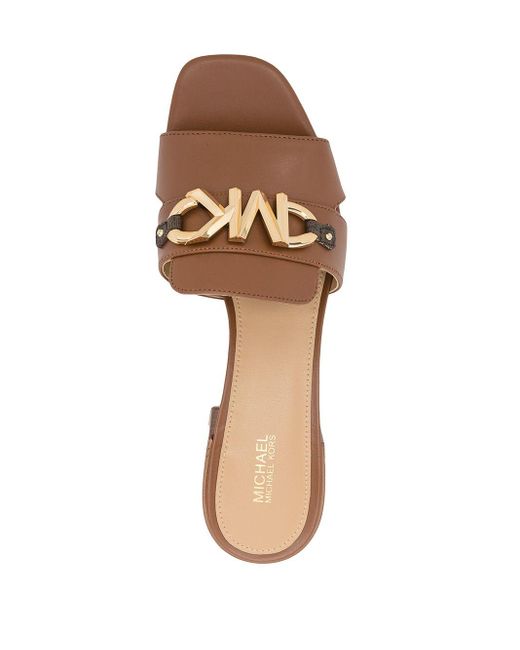 MICHAEL Michael Kors Leer Izzy Leren Muiltjes in het Bruin - Lyst