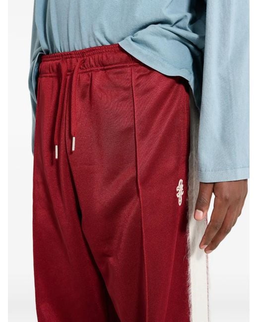 Stockholm Surfboard Club Red Pantalon De Jogging À Rayures Latérales for men