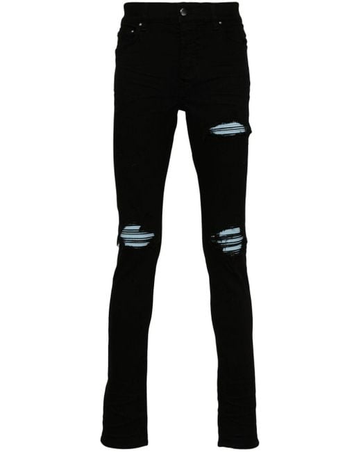 Jean skinny MX1 à effet usé Amiri pour homme en coloris Black
