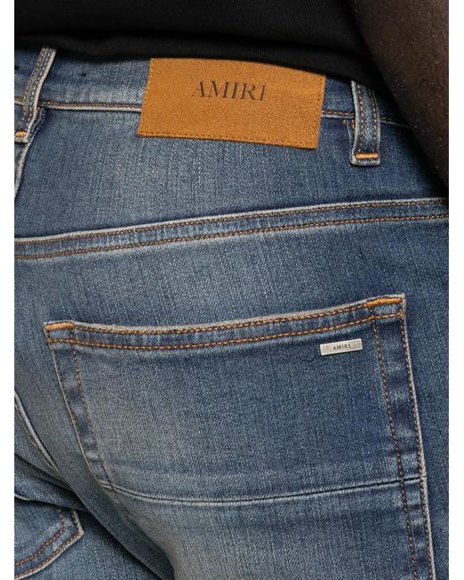 Amiri Blue Distressed Patchwork Jeans for men