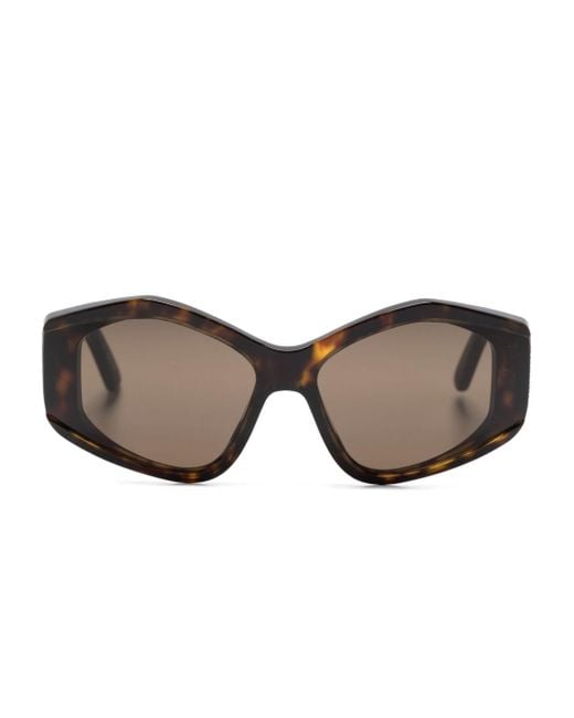 Gafas de sol con montura cat eye y logo Balenciaga de color Brown