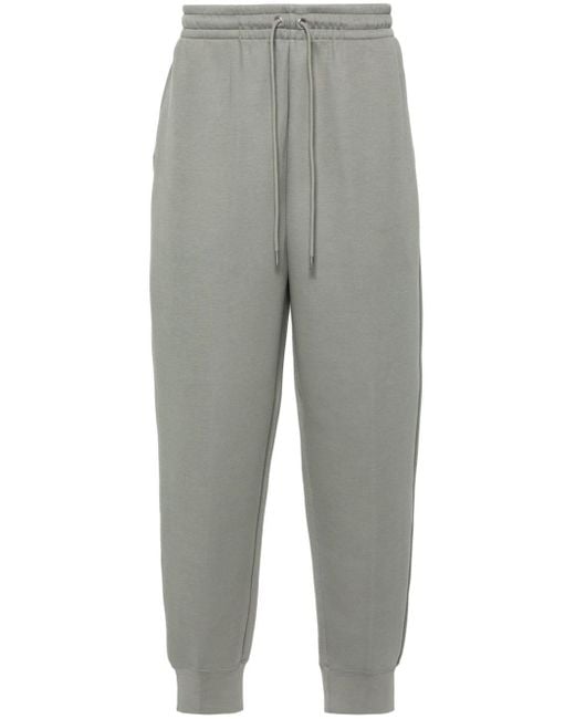 Pantalones de chándal con cordones Nike de hombre de color Gray
