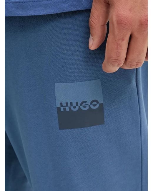 HUGO Blue Logo-Patch Elasticated-Cuff Track Pants for men