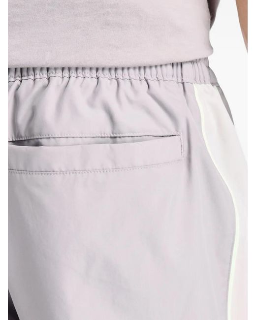 New Balance Purple Trackside Woven Track Pants for men