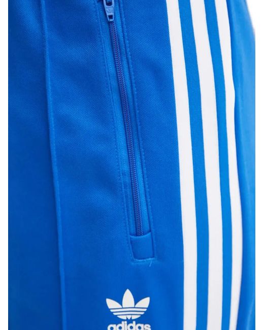 Adidas Blue Three-Stripe Track Pants