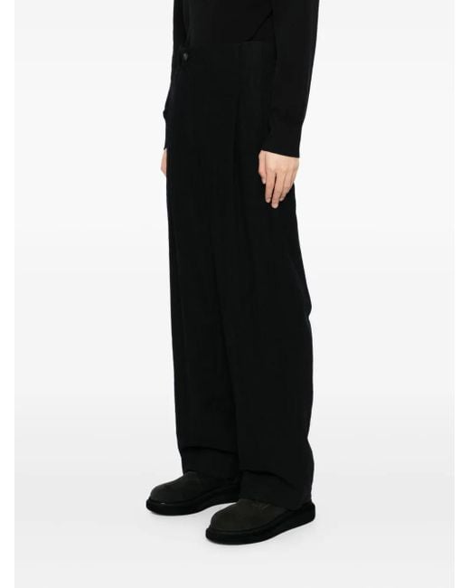 DEVOA Black Pleated-Panel Trousers for men