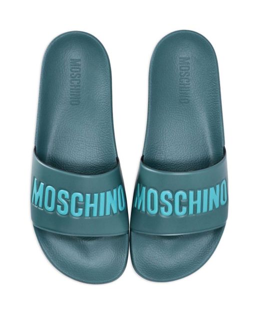Sandali slides con logo goffrato di Moschino in Blue da Uomo