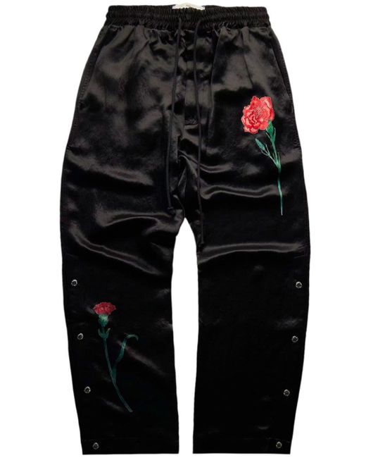 Pantaloni sportivi con applicazione a fiori di Song For The Mute in Black da Uomo