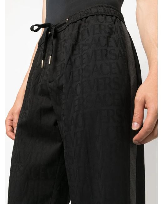 Versace Black Allover Track Pants for men