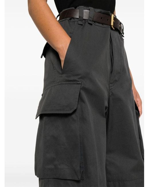 Pantalon Cassandre à poches cargo Saint Laurent en coloris Black