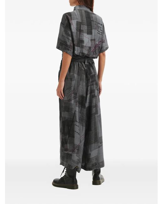 Y's Yohji Yamamoto Black Newspaper-Print Jumpsuit