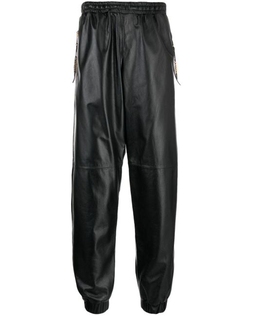 Moschino Black Cropped Leather Track Pants for men