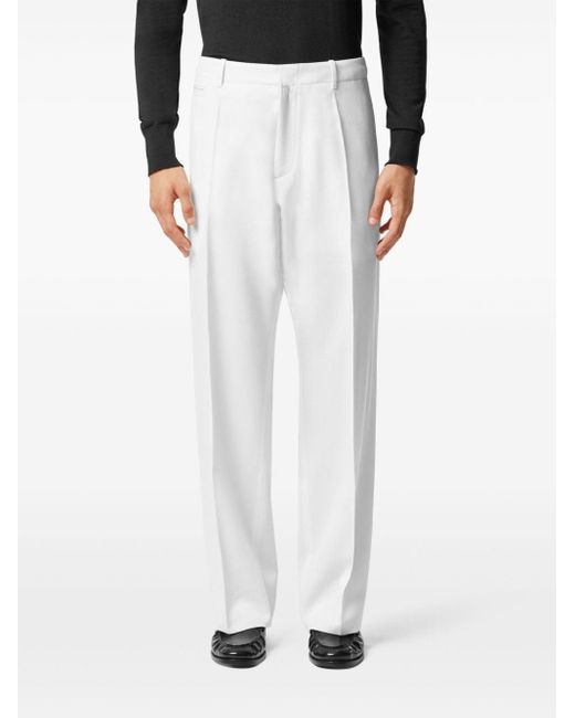 Pantalones de vestir texturizados Versace de hombre de color White