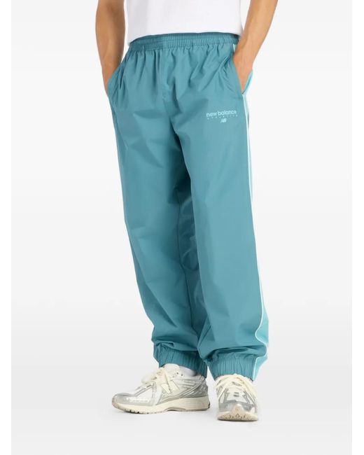 New Balance Blue Trackside Woven Track Pants for men