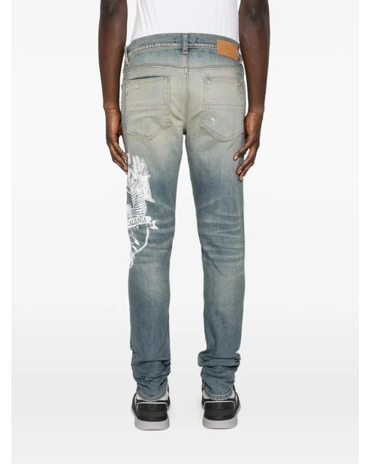 Amiri Blue Ripped Print Jeans for men