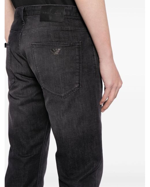 Jeans slim a vita media di Emporio Armani in Black da Uomo