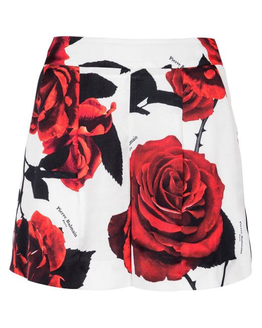 Pantalones cortos con estampado de rosas Balmain de color Red
