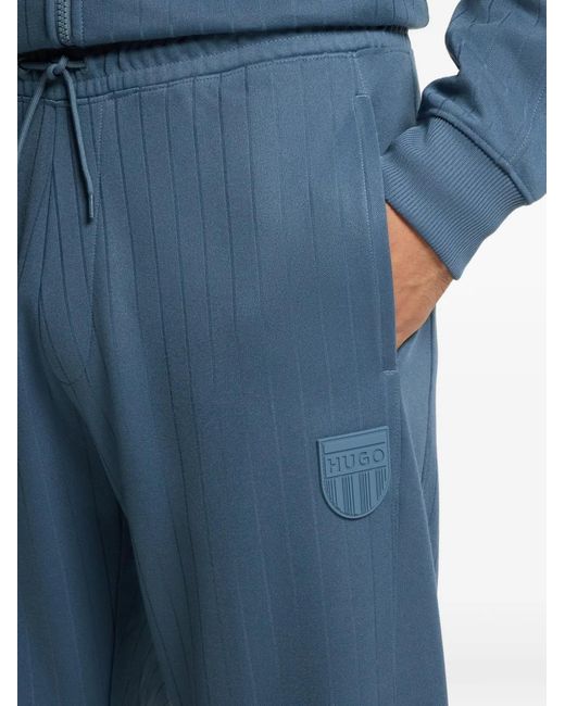 HUGO Blue Logo-Patch Track Pants for men