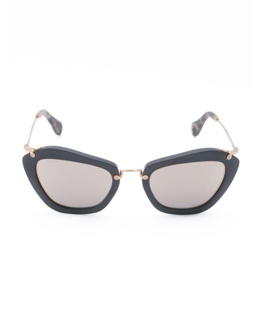 'Noir' sunglasses di Miu Miu in Black