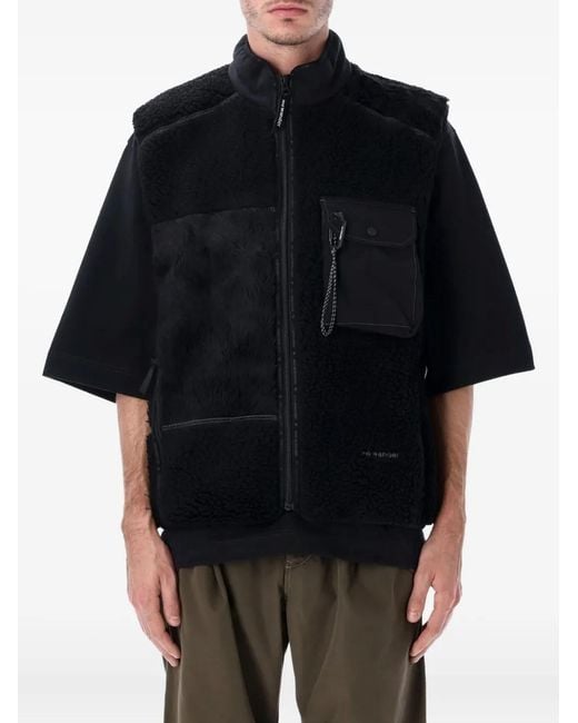 And Wander Black Sleeveless Gilet for men
