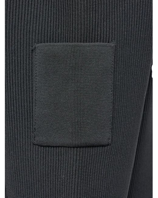 Amomento Blue Mock Neck Ribbed Jacket for men