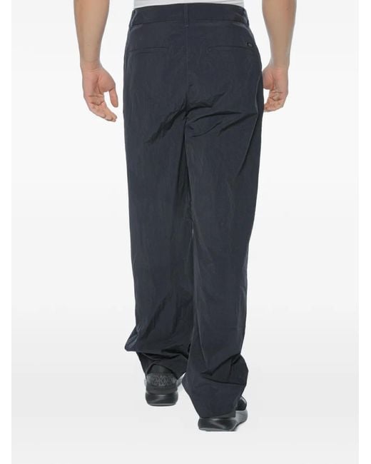 ARMANI EXCHANGE Blue Pleated-Front Crinkled Trousers for men