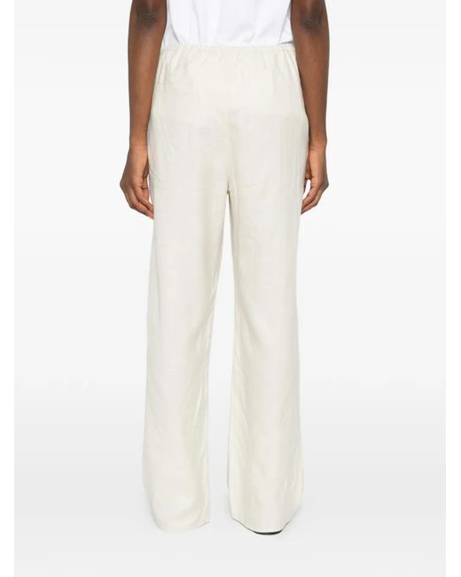 Totême  White Monogram-Pattern Trousers