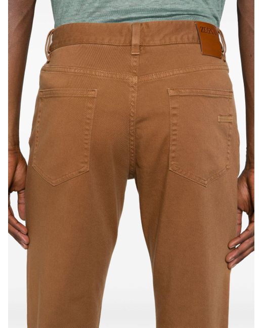 Garment-dyed slim-cut jeans Zegna pour homme en coloris Brown