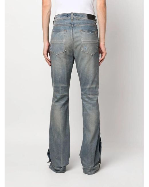 Amiri Blue Ripped-Detail Bootcut Jeans for men