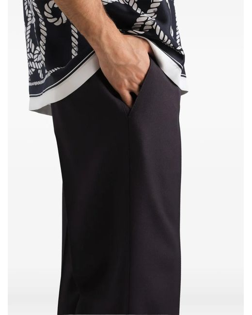 Dolce & Gabbana Blue Virgin-Wool Trousers for men