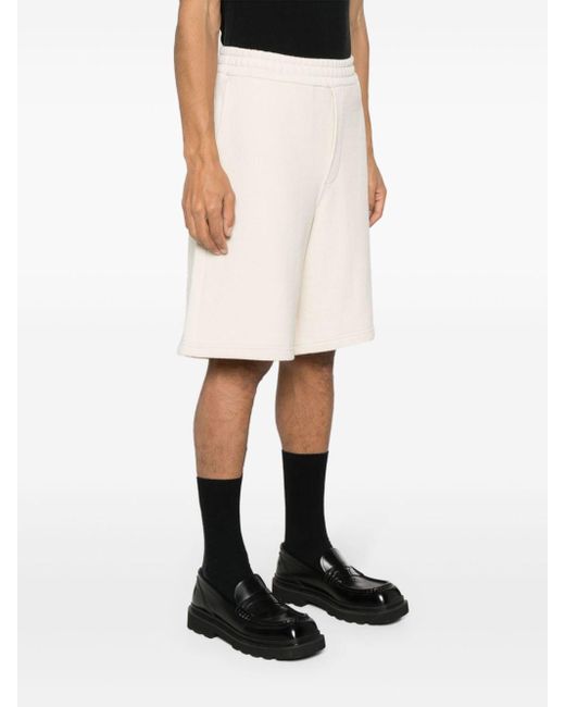 Pantalones cortos de deporte con logo triangular Prada de hombre de color White