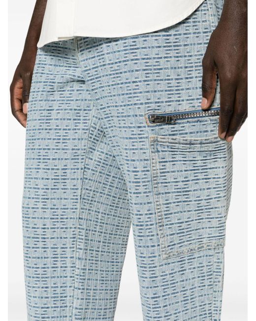 Jeans a gamba ampia con placca logo di Givenchy in Blue da Uomo