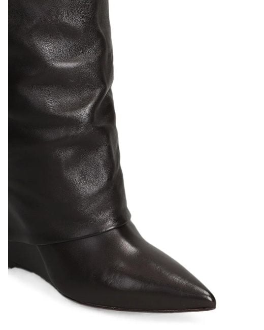 The Seller Black Pointed-Toe Wedge Boots
