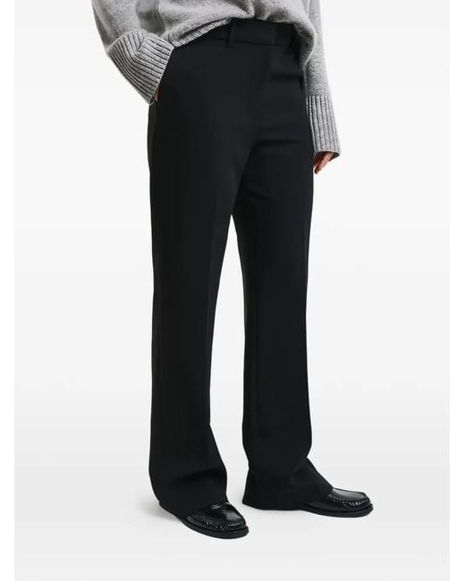 Pantalones con pinzas Gant de color Black