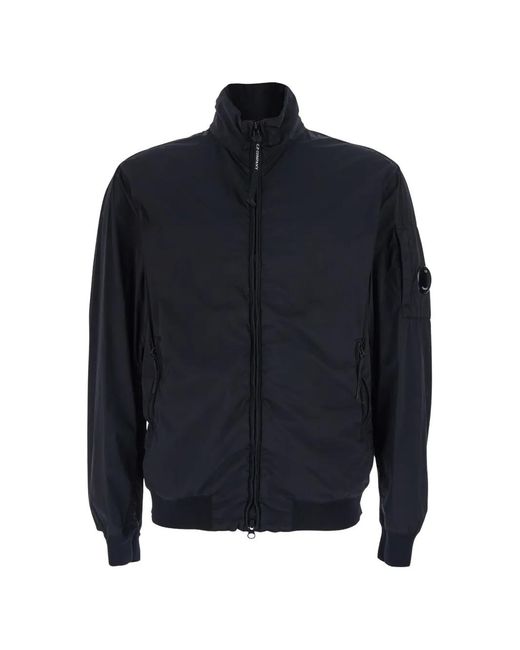 C P Company Blue Nylon Turtleneck Jacket With Lens Detail On The Left Sleeve for men