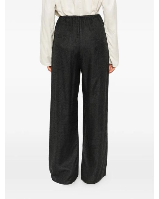 Totême Black Monogram Flannel Trousers