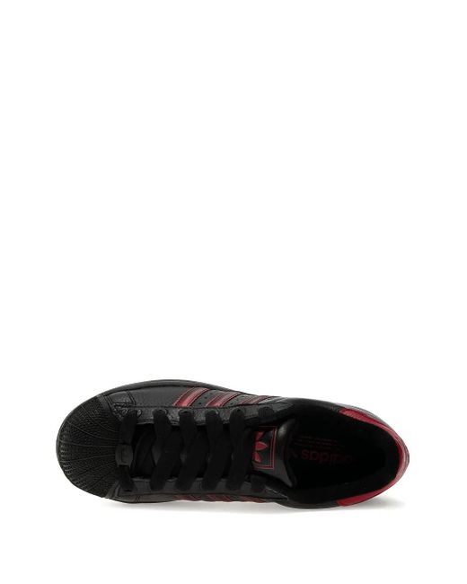 Adidas Black Shell-Toe Striped Trainers for men
