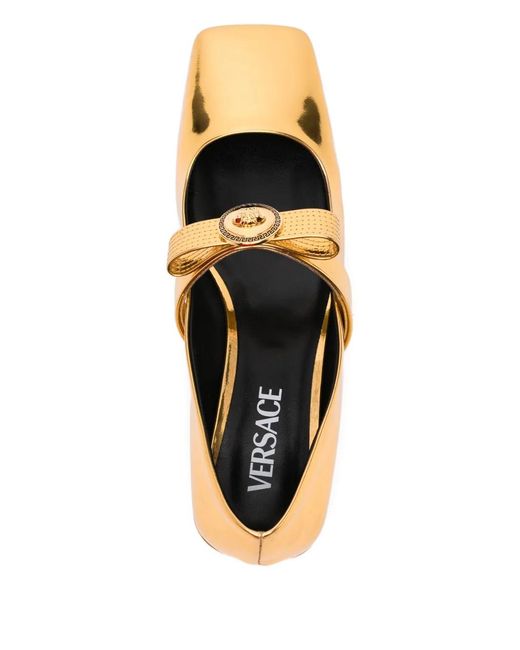 Mules À Bride À Boucle Versace en coloris Natural