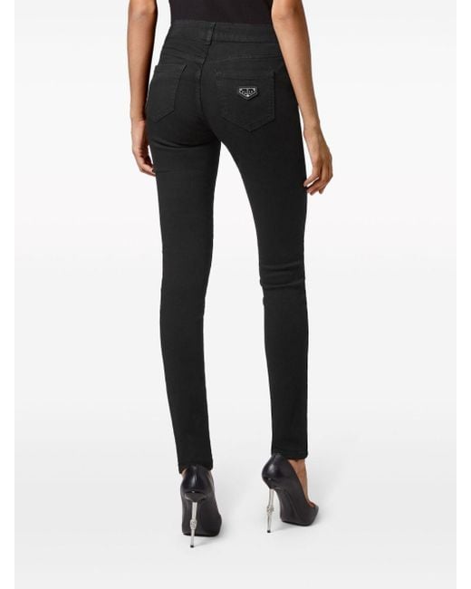 Jeans skinny con placca logo di Philipp Plein in Black