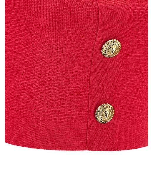 Top de lana con detalle de botón Balmain de color Red