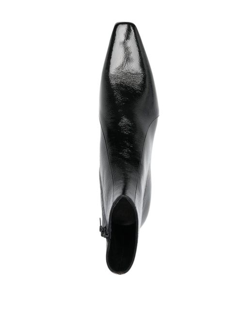 Stivaletti effetto lucido di Saint Laurent in Black da Uomo