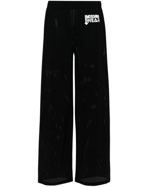 Pantalones anchos con logo Moschino de color Black